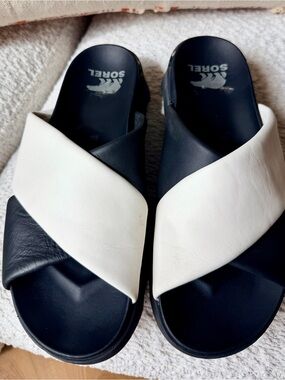 Sorel Black and White Crossover Slide Sandals